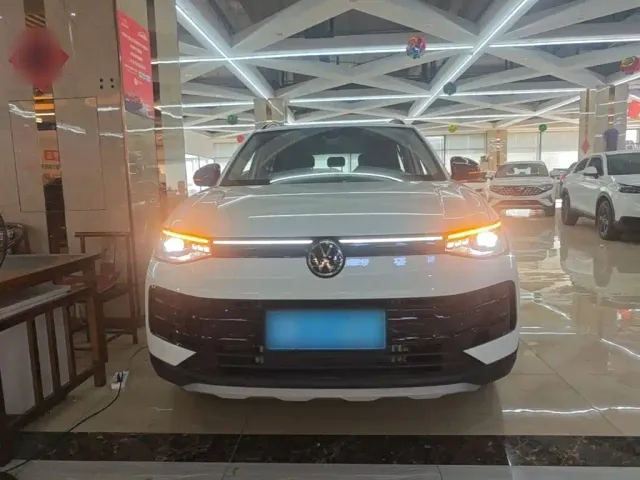 Volkswagen Tharu — Фото автомобиля 2