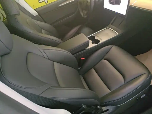 Tesla Model Y — Фото автомобиля 24