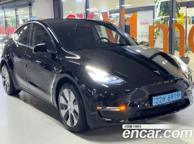 Tesla Model Y — Фото автомобиля 2