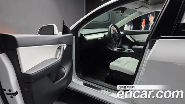 Tesla Model Y — Фото автомобиля 10