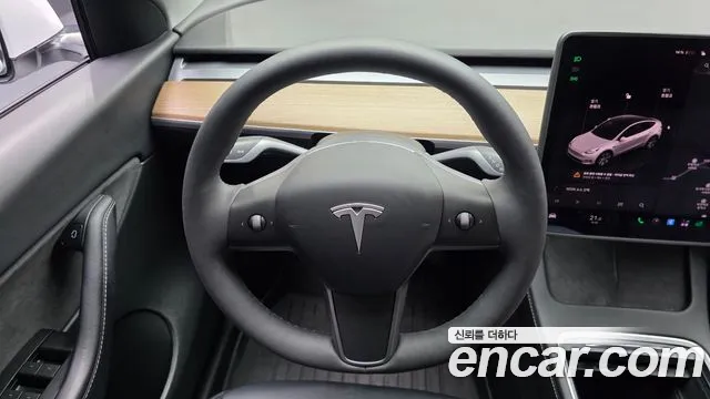 Tesla Model Y — Фото автомобиля 13