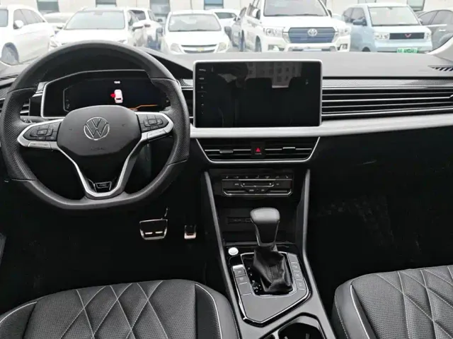 Volkswagen Tiguan L — Фото автомобиля 12