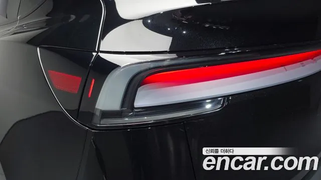 Tesla Model Y — Фото автомобиля 7