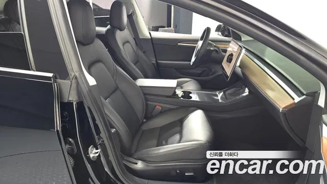 Tesla Model 3 — Фото автомобиля 26