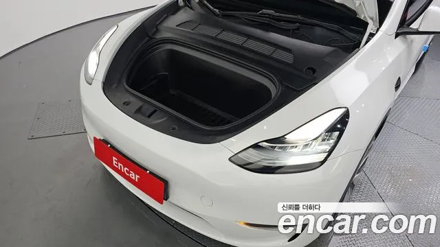 Tesla Model Y — Фото автомобиля 5