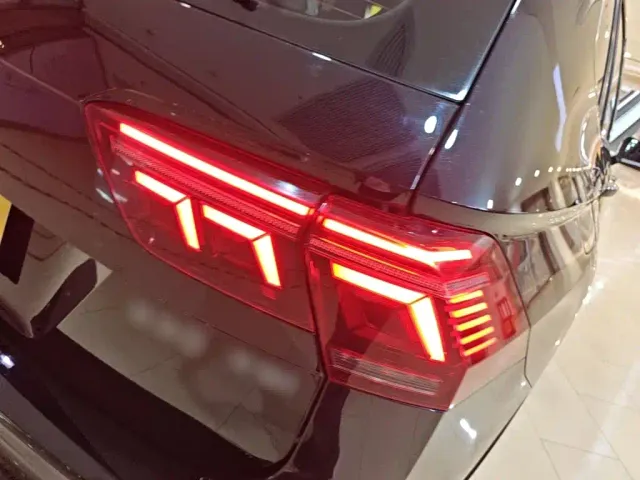 Volkswagen Tiguan L — Фото автомобиля 7
