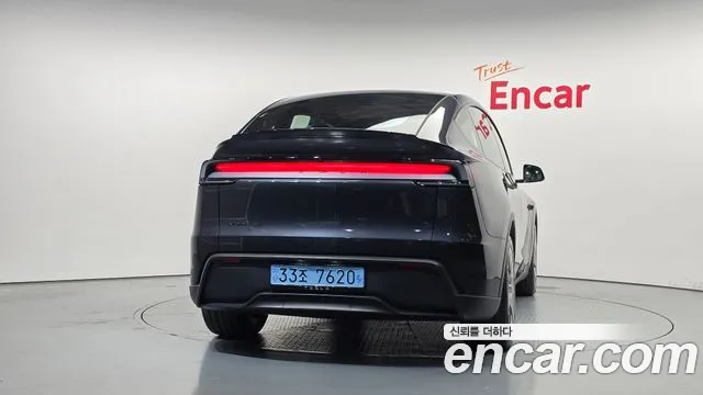 Tesla Model Y — Фото автомобиля 4