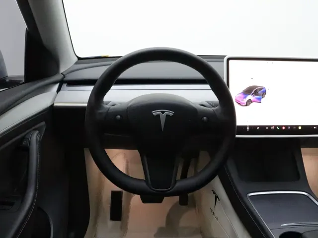 Tesla Model Y — Фото автомобиля 16