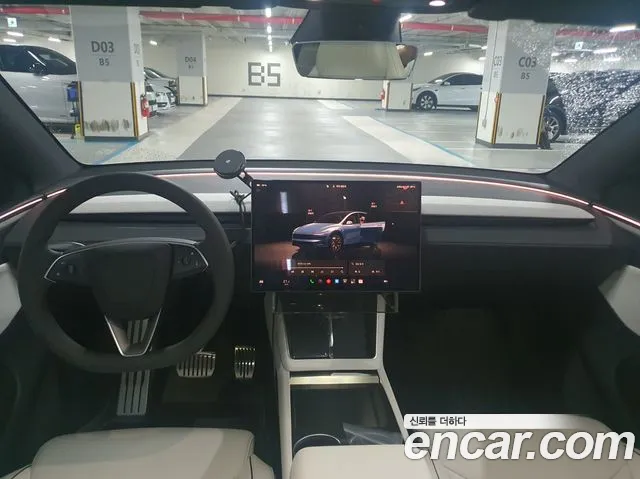 Tesla Model Y — Фото автомобиля 11