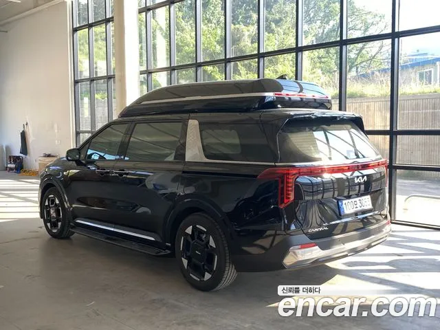 Kia Carnival Generation 4 — Фото автомобиля 2
