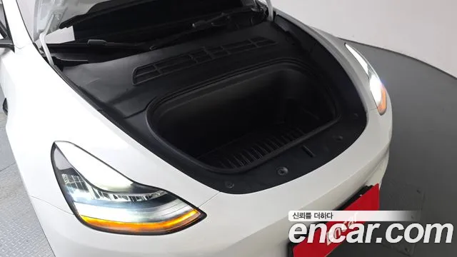 Tesla Model Y — Фото автомобиля 8