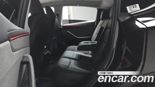 Tesla Model Y — Фото автомобиля 18