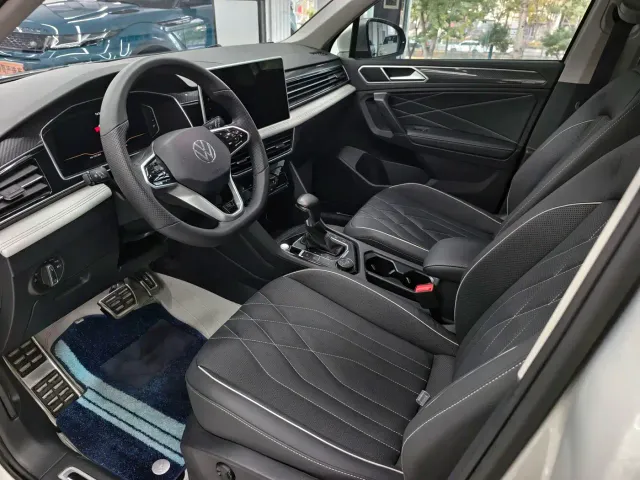 Volkswagen Tiguan L — Фото автомобиля 5