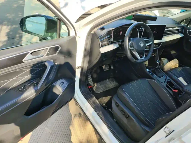 Volkswagen Tiguan L — Фото автомобиля 15
