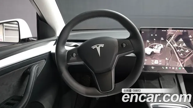 Tesla Model Y — Фото автомобиля 13