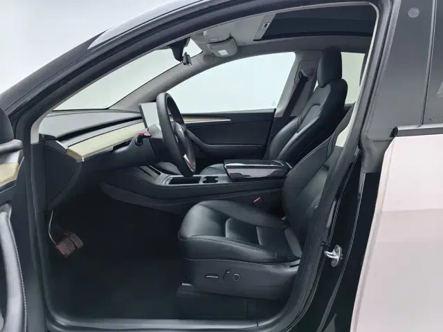 Tesla Model Y — Фото автомобиля 10