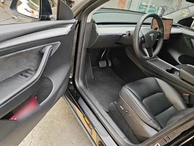 Tesla Model Y — Фото автомобиля 15