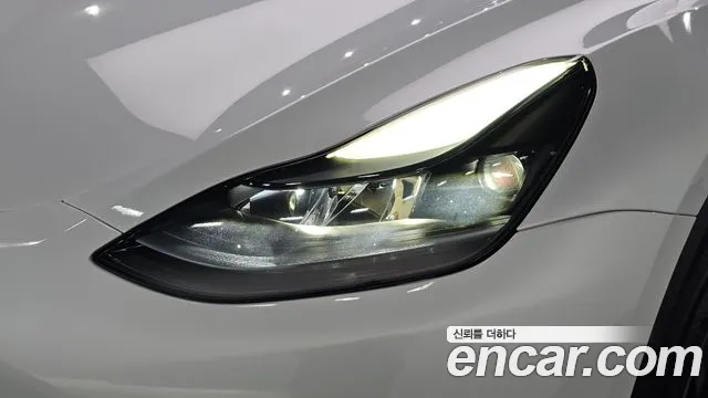 Tesla Model Y — Фото автомобиля 7