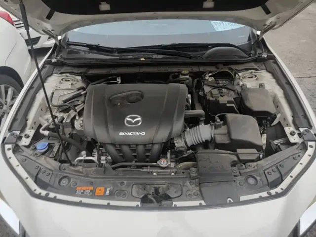 Mazda Axela — Фото автомобиля 19