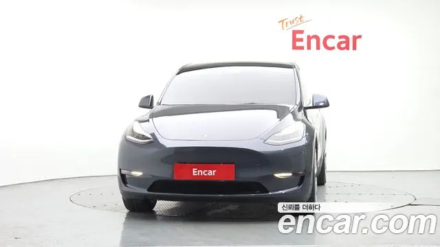Tesla Model Y — Фото автомобиля 3