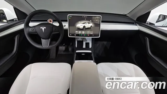 Tesla Model Y — Фото автомобиля 9