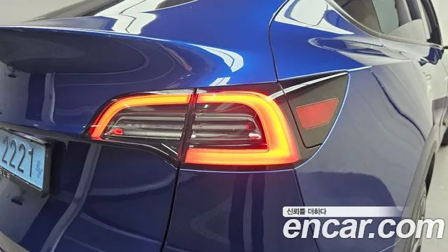 Tesla Model Y — Фото автомобиля 8