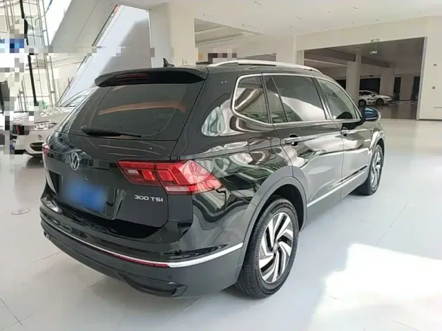Volkswagen Tiguan L — Фото автомобиля 6