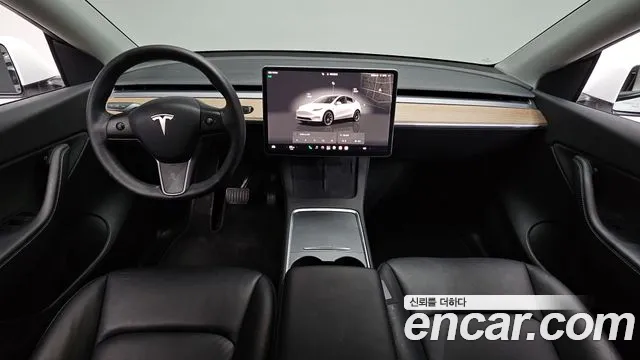 Tesla Model Y — Фото автомобиля 10
