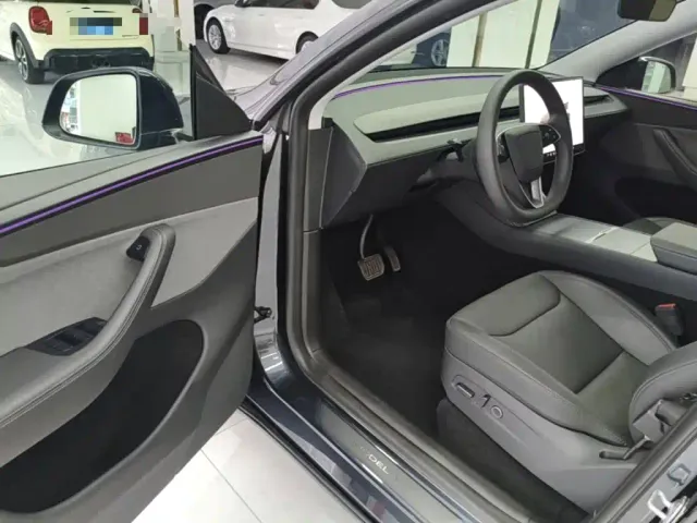 Tesla Model Y — Фото автомобиля 15