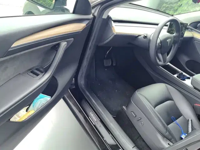 Tesla Model Y — Фото автомобиля 15