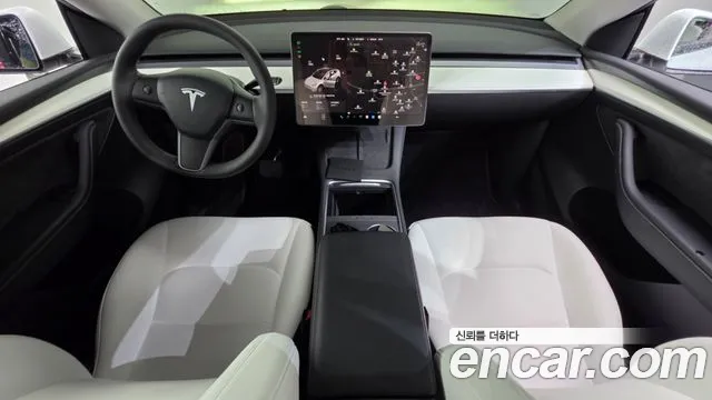 Tesla Model Y — Фото автомобиля 7