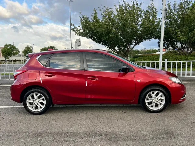 Nissan Tiida — Фото автомобиля 12