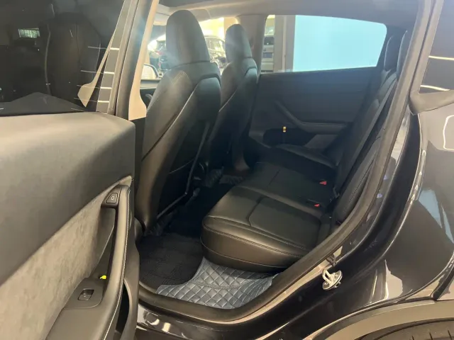 Tesla Model Y — Фото автомобиля 8