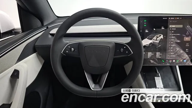 Tesla Model Y — Фото автомобиля 13