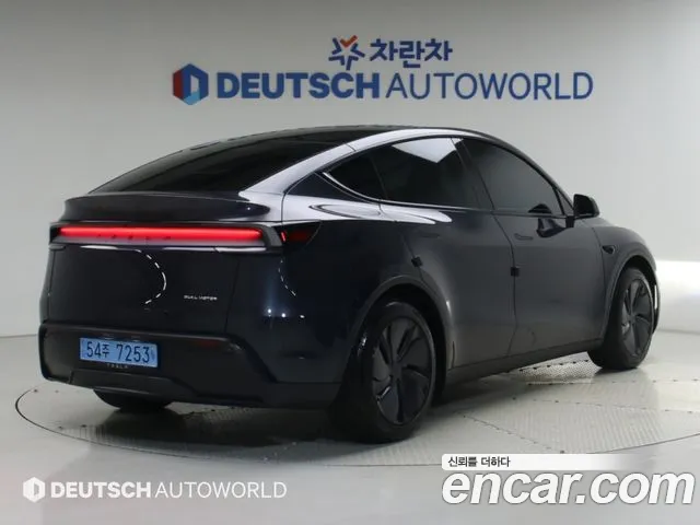 Tesla Model Y — Фото автомобиля 4