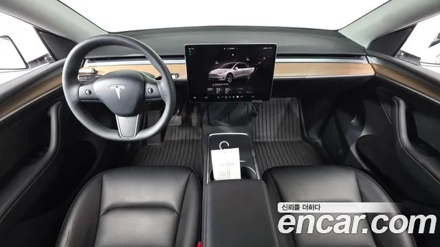 Tesla Model Y — Фото автомобиля 10