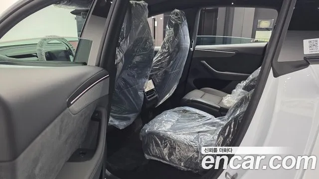 Tesla Model Y — Фото автомобиля 16