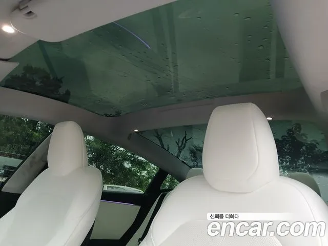 Tesla Model 3 — Фото автомобиля 18