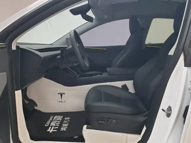 Tesla Model Y — Фото автомобиля 12