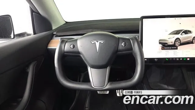 Tesla Model Y — Фото автомобиля 19