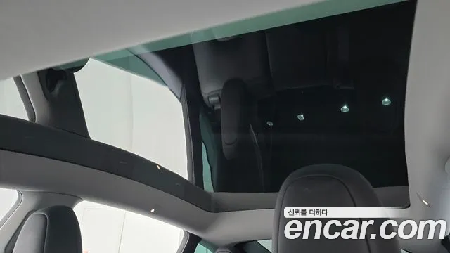 Tesla Model Y — Фото автомобиля 21
