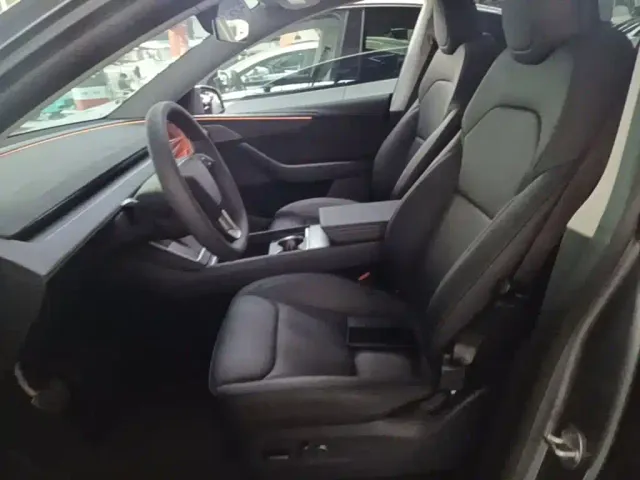 Tesla Model Y — Фото автомобиля 14