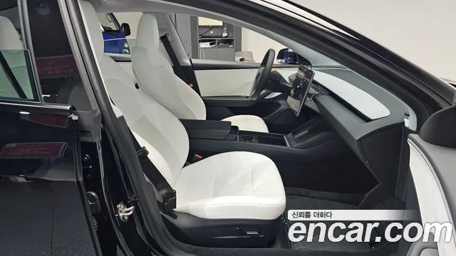 Tesla Model 3 — Фото автомобиля 16