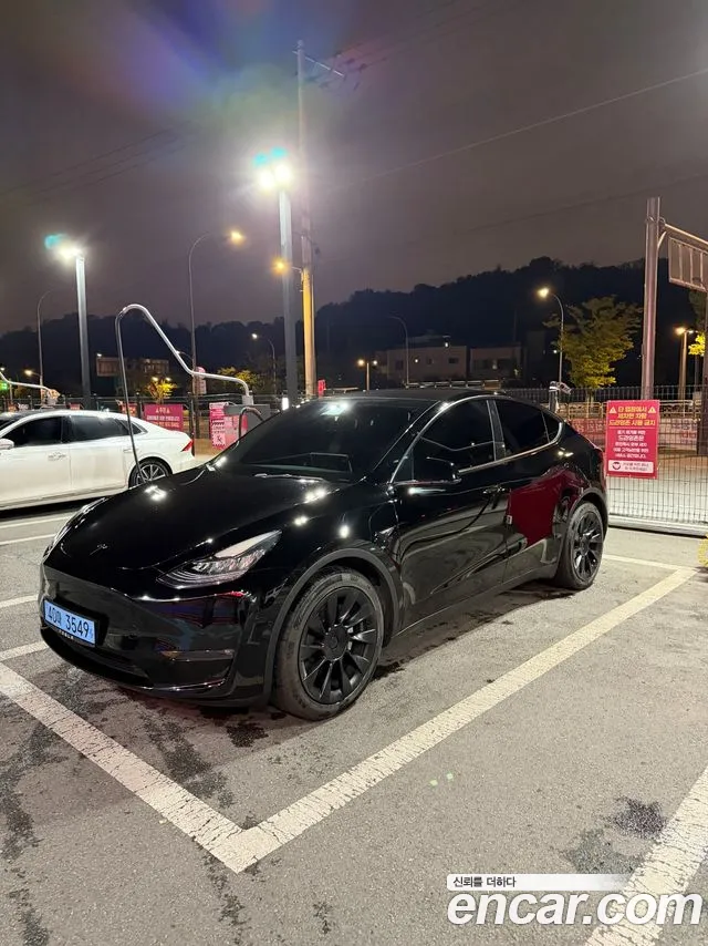 Tesla Model Y — Фото автомобиля 5