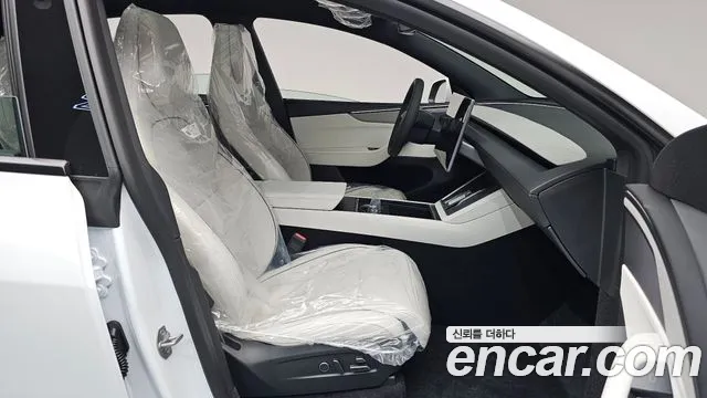 Tesla Model Y — Фото автомобиля 10