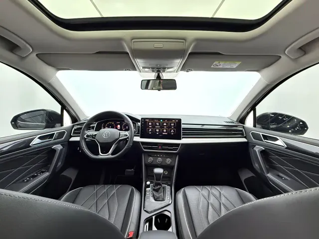Volkswagen Tiguan L — Фото автомобиля 10