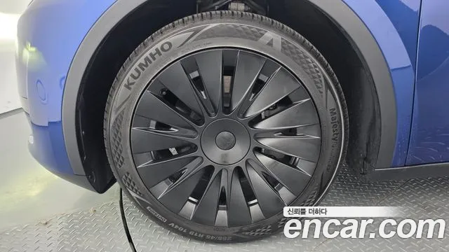 Tesla Model Y — Фото автомобиля 5