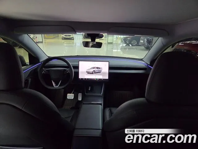 Tesla Model Y — Фото автомобиля 7