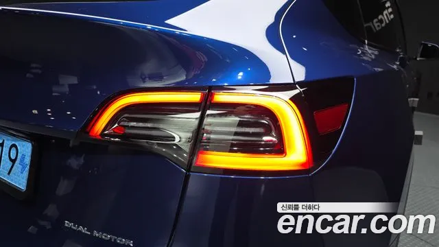 Tesla Model Y — Фото автомобиля 8