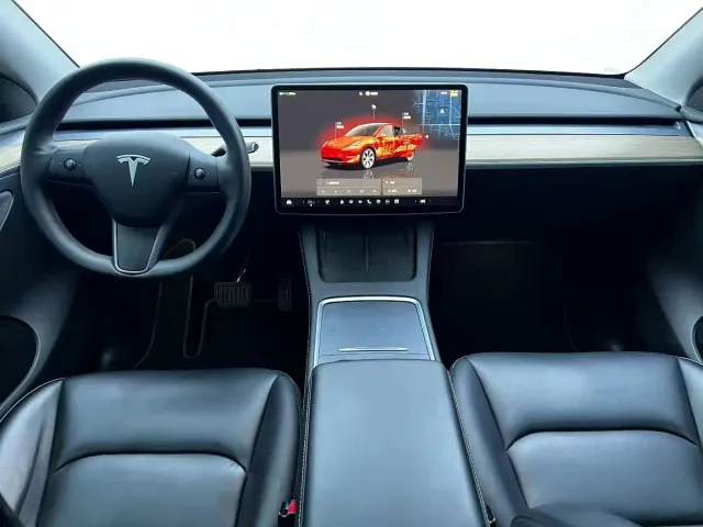 Tesla Model Y — Фото автомобиля 6